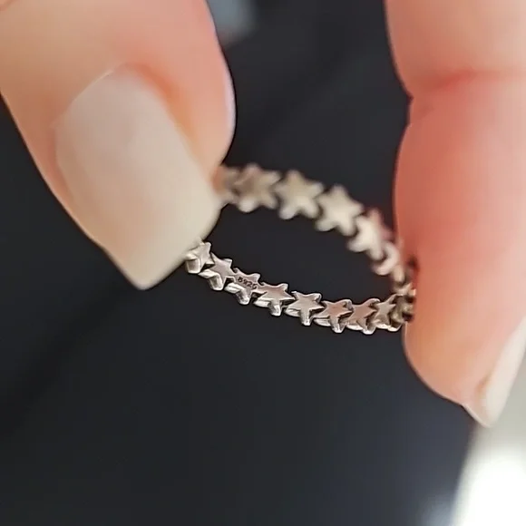 Sterling silver ring with stars all the way around the band. Infinity star band - Picture 4 of 4